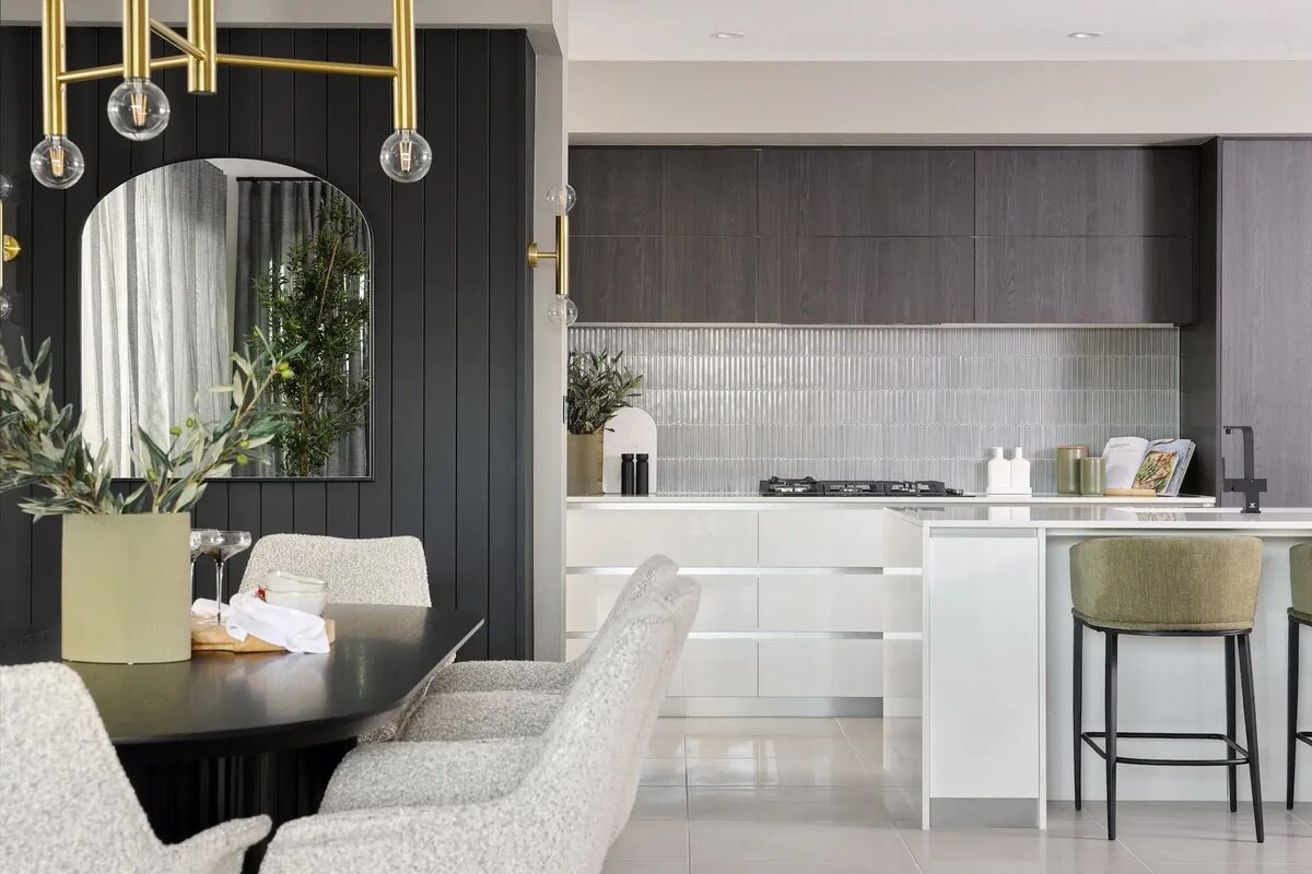 The kitchen and dining area of a new home
