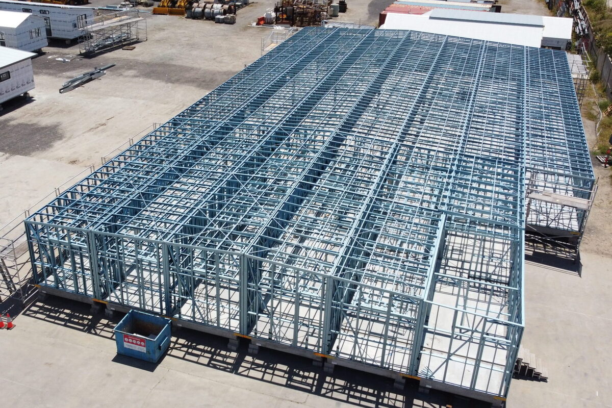 An aerial view of rows of steel building frames assembled in the Steel Frames WA yard