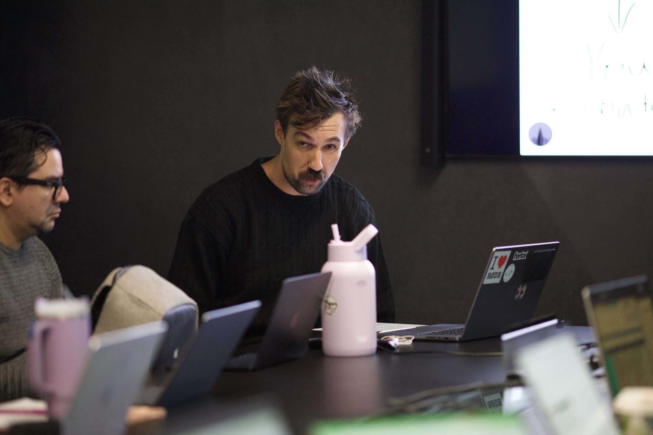 The Scalify team working on laptops during an AI workshop