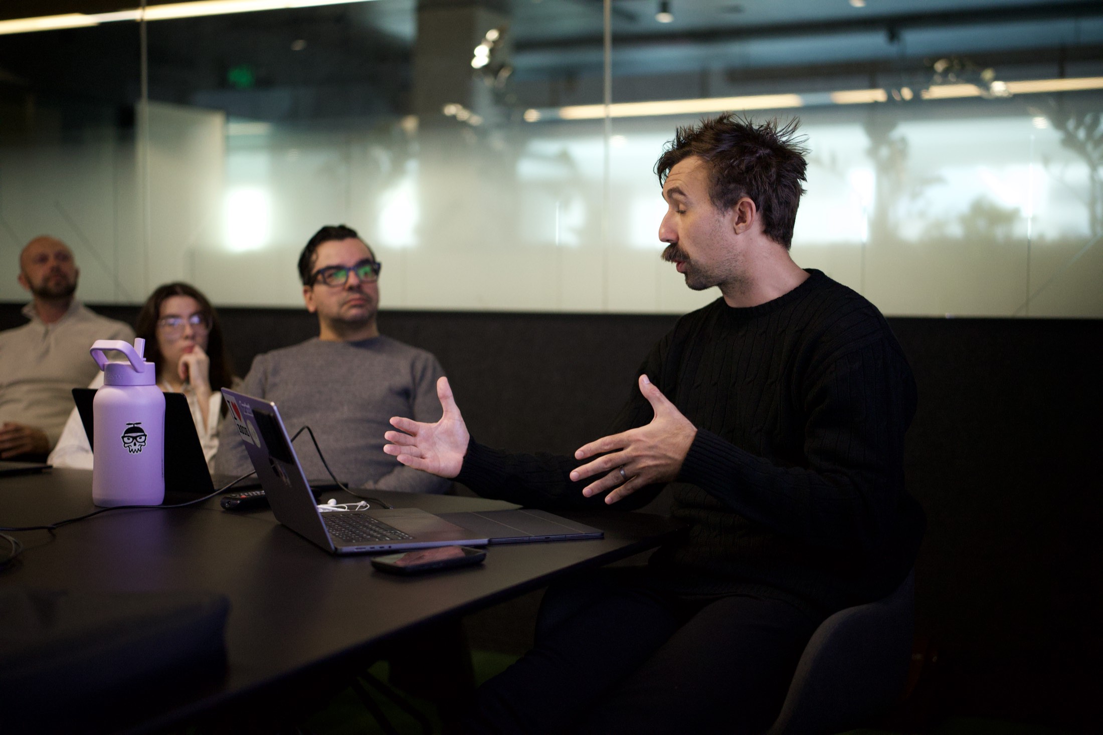 A Scalify consultant talking a Perth business team through an AI integration plan