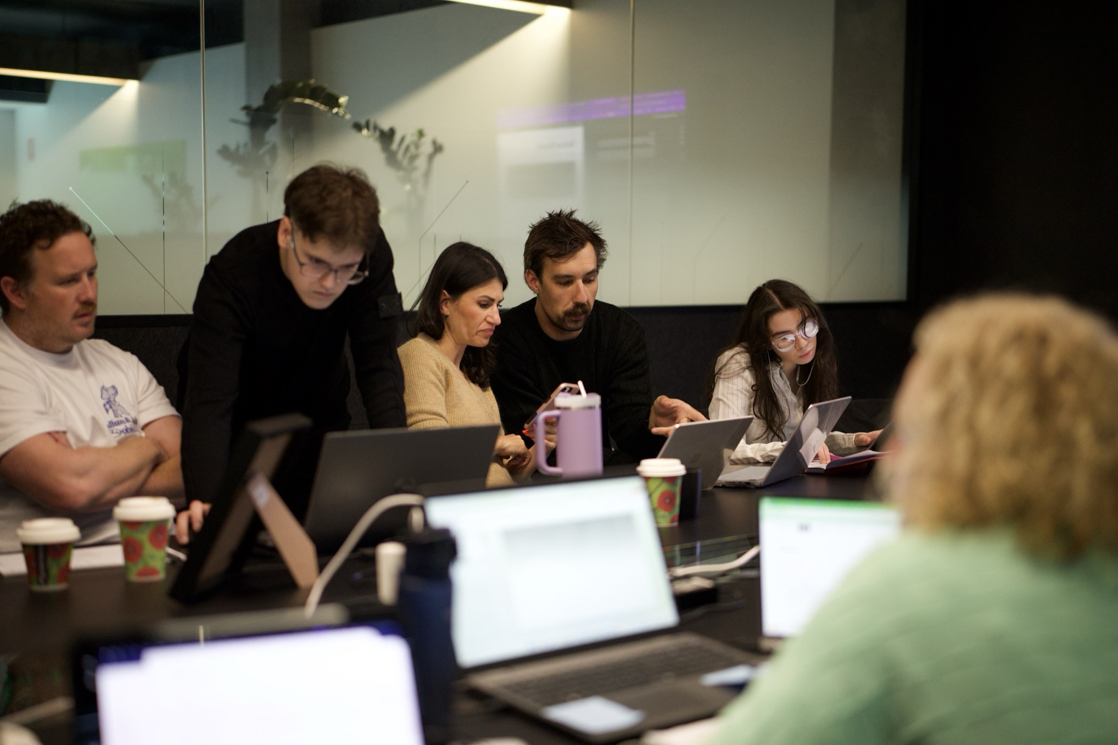 Staff working through quotes on laptops during a Scalify workshop