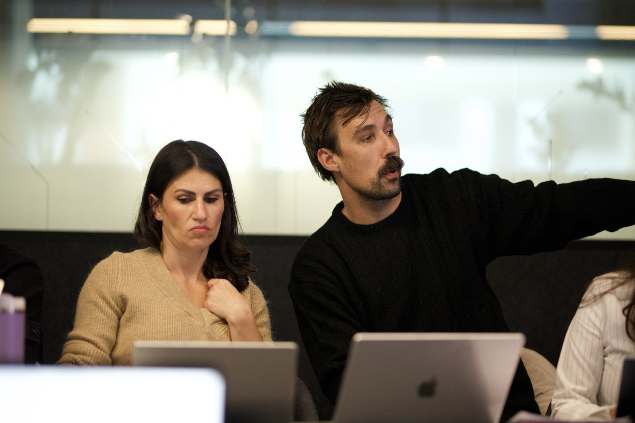A Scalify trainer pointing out a Claude workflow during a session