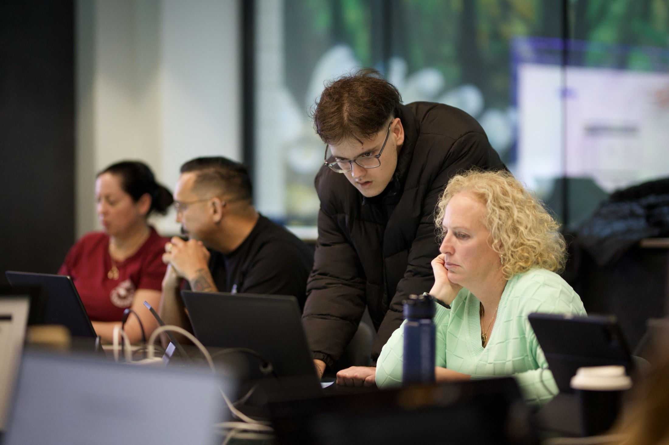 Attendees listening during a Scalify AI session