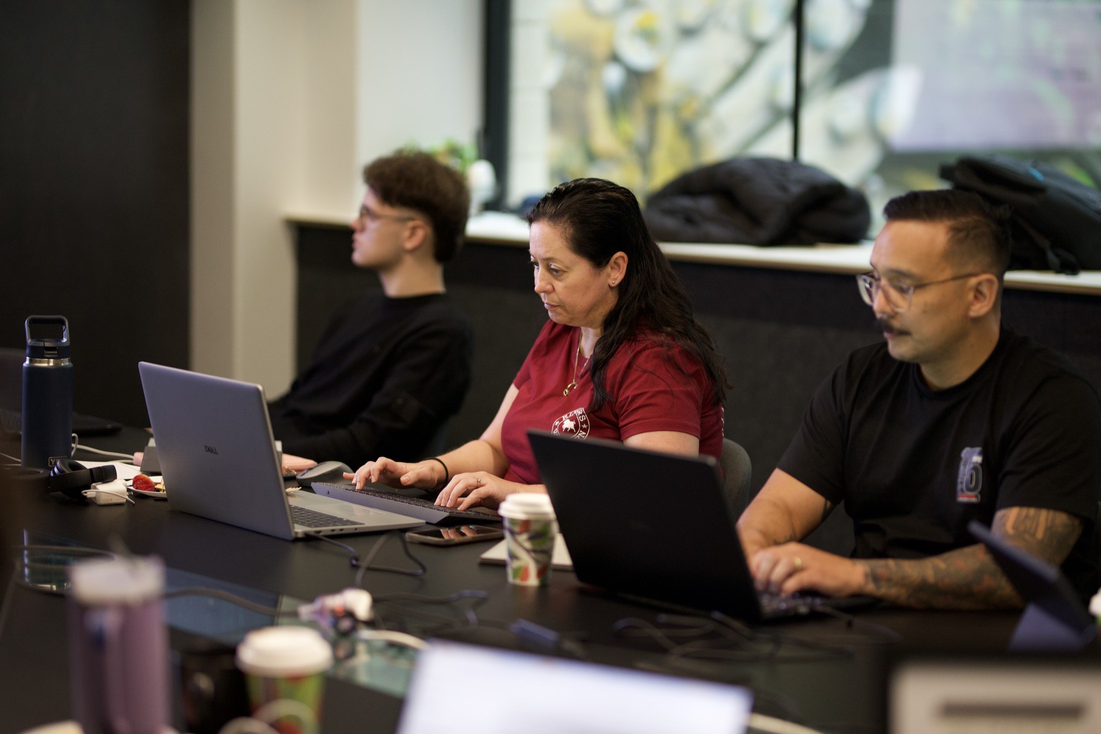 Workshop attendees building with Copilot Studio on their laptops during Scalify training in Perth