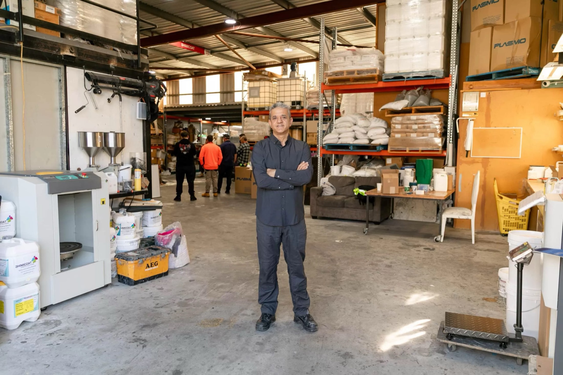 The Shimicoat owner standing in their coatings warehouse in Western Australia